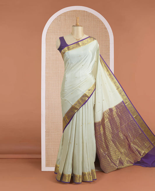 Light sandal zari buttas woven Mysore silk saree, contrast intricate zari border, and jaal patterned pallu