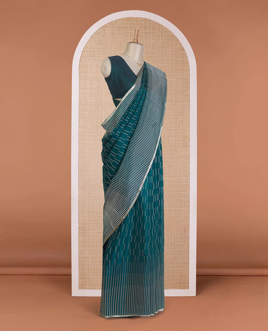 Green zari buttas Mysore silk saree, temple seppu rekku zari border, and chevron design pallu