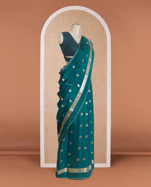 Green zari elephant buttas Mysore silk saree, traditional zari design rettai pettu border, and butta enclosed checked pallu