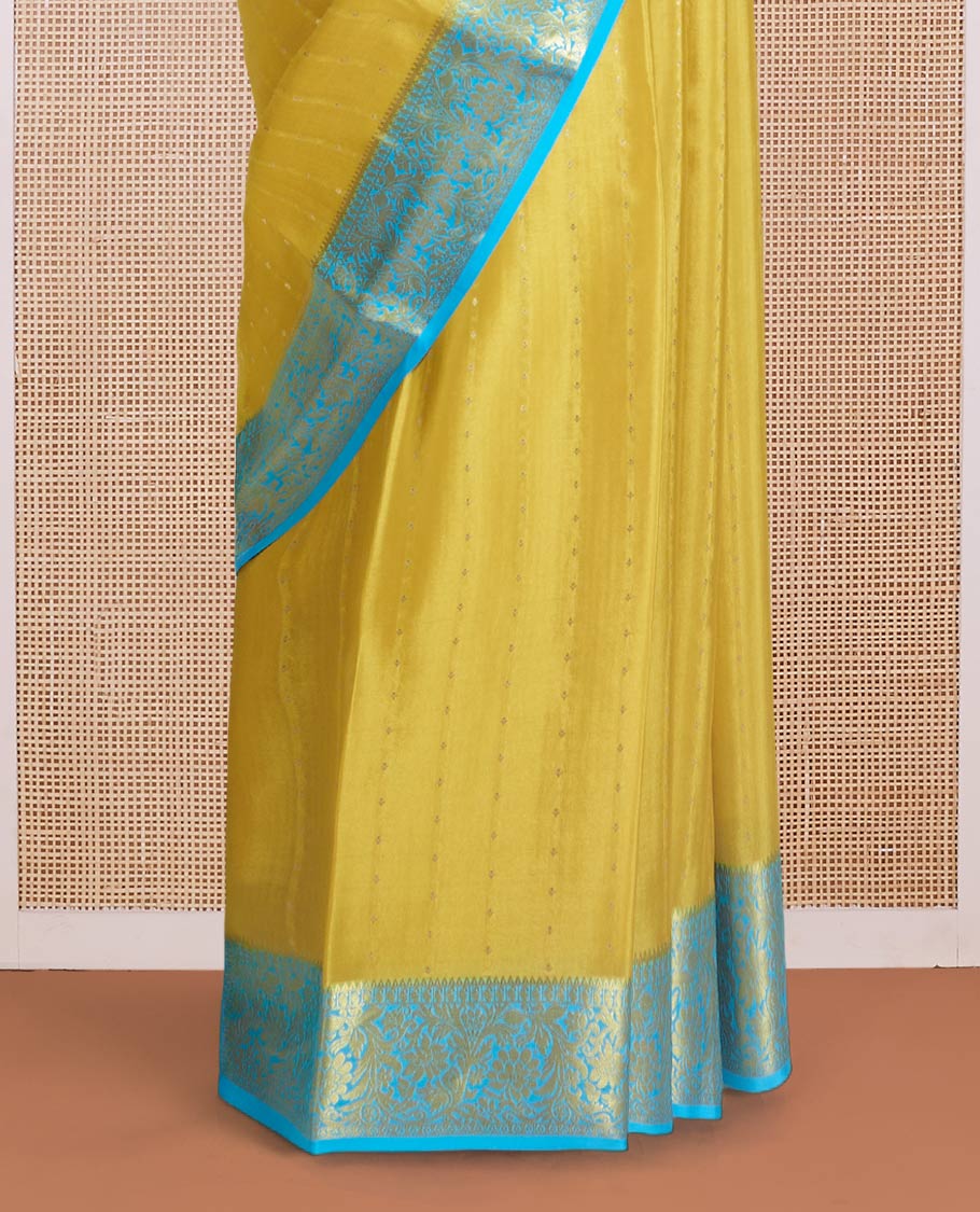 Yellow zari buttas Mysore silk saree, contrast floral zari border, and intricate pallu