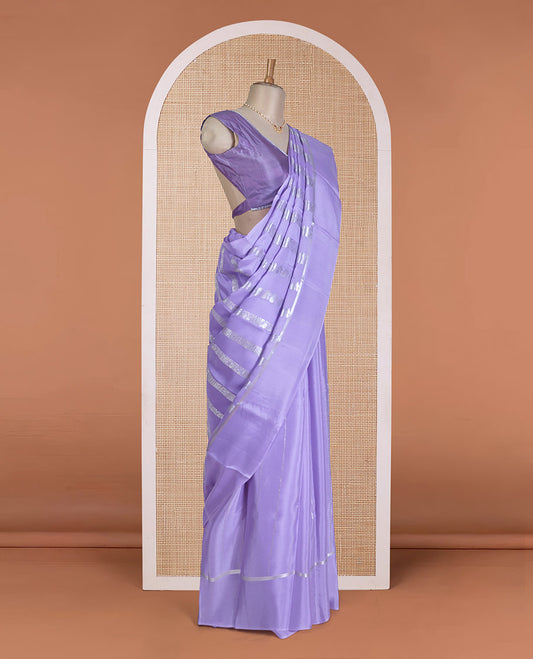 Lavender traditional flora-fauna motifs steeped with Mysore silk saree, self-border, and intricate pallu