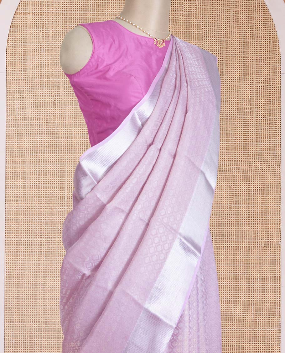 Pale lavender jacquard Mysore silk saree, traditional zari border, and jaal pallu
