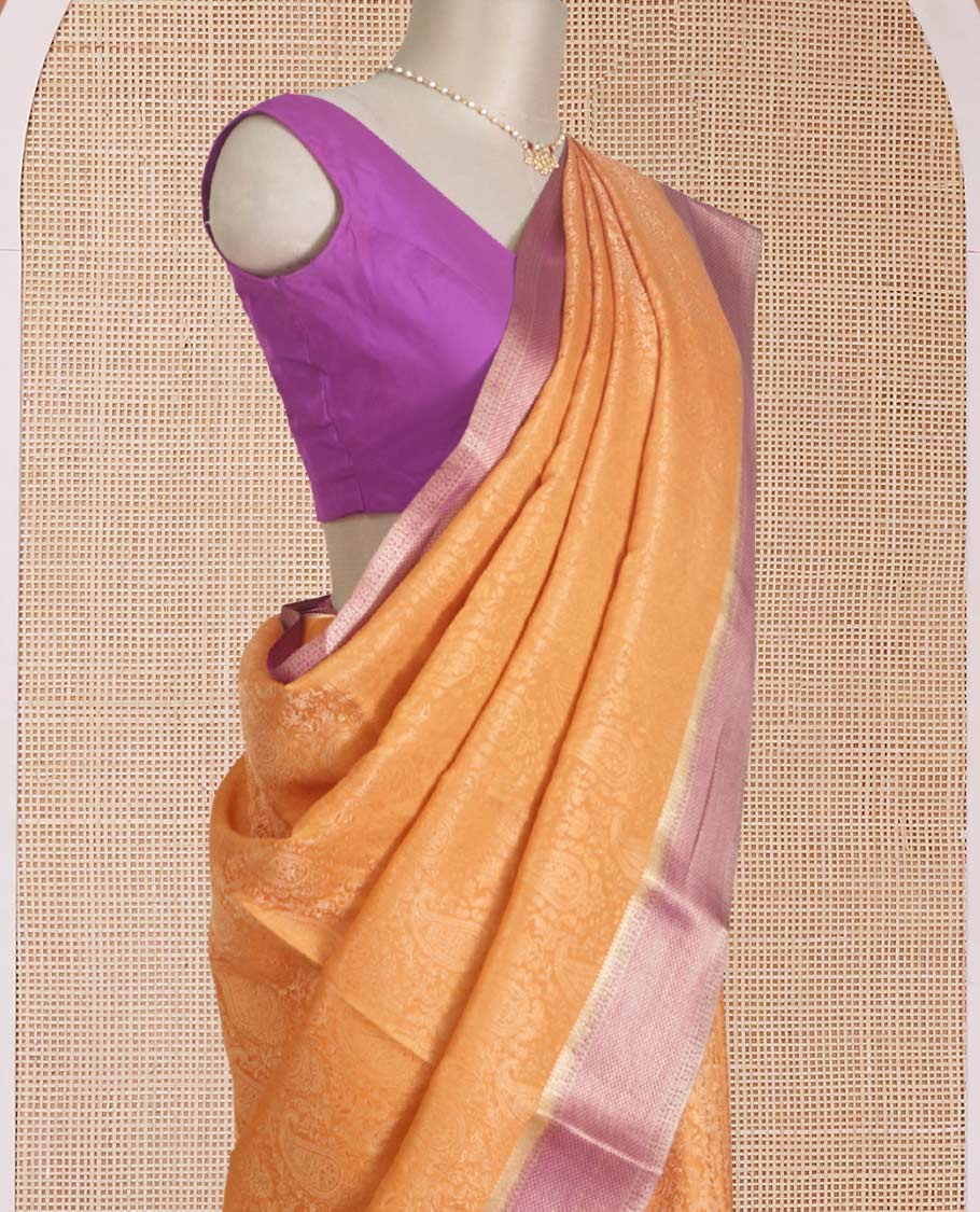 Orange jacquard Mysore silk saree, contrast traditional zari border, and chevron design pallu