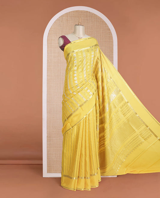 Yellow traditional zari steeped Mysore silk saree, rettai pettu zari border, and intricate pallu