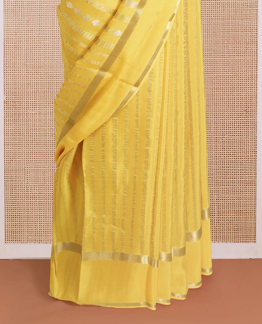 Yellow traditional zari steeped Mysore silk saree, rettai pettu zari border, and intricate pallu