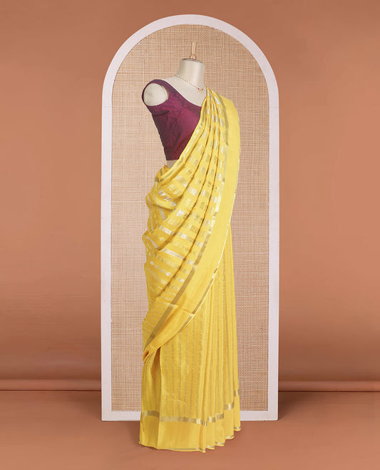 Yellow traditional zari steeped Mysore silk saree, rettai pettu zari border, and intricate pallu