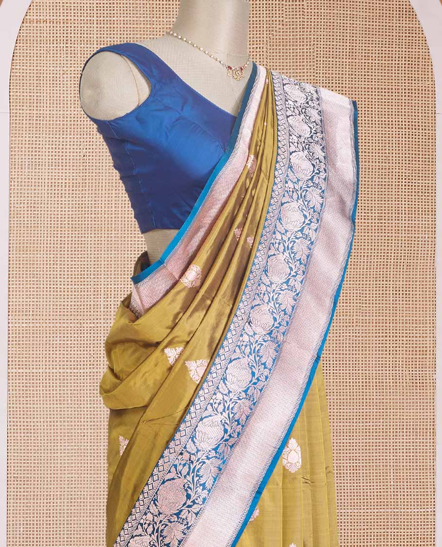 Gold zari buttas Banarasi kathan silk saree, contrast traditional zari floral creeper border, and pallu features dobby style buttas