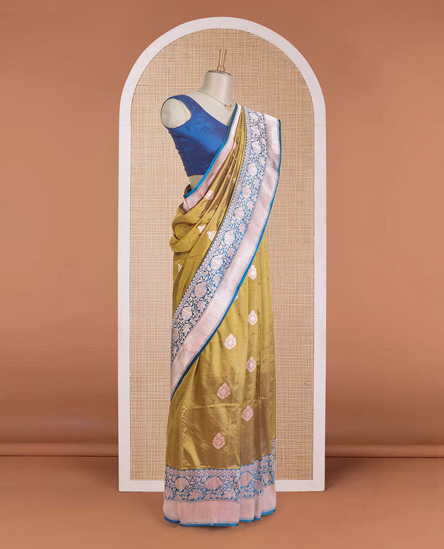 Gold zari buttas Banarasi kathan silk saree, contrast traditional zari floral creeper border, and pallu features dobby style buttas
