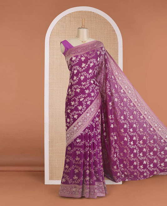 Purple floral jaal jacquard fancy crepe saree, floral design zari border, and floral jaal pallu