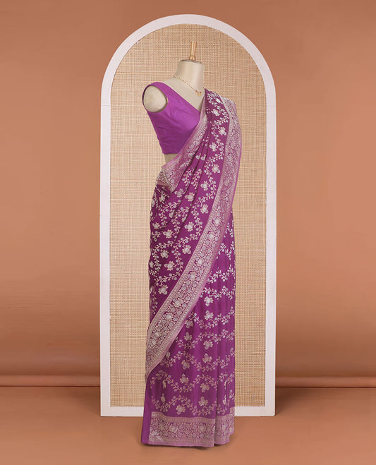 Purple floral jaal jacquard fancy crepe saree, floral design zari border, and floral jaal pallu