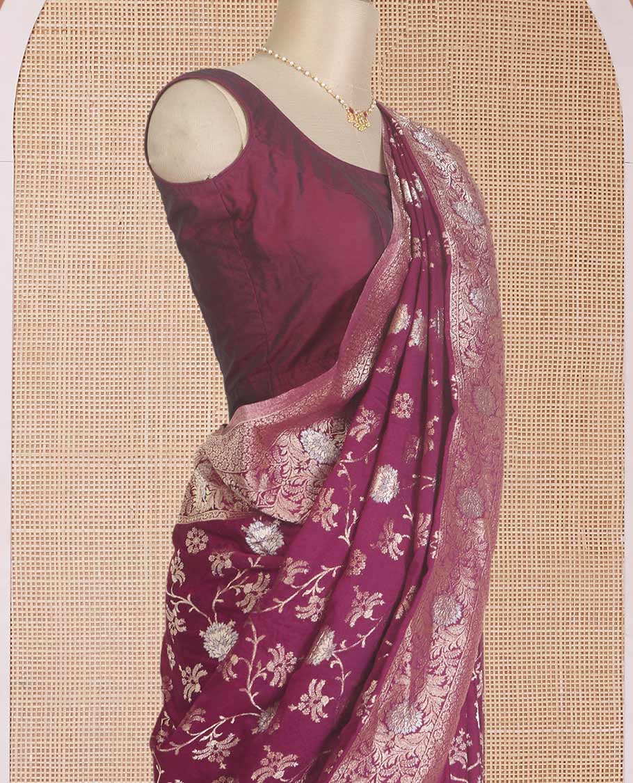 Maroon floral jaal jacquard fancy crepe saree, floral creeper zari border, and pallu of floral jaal design