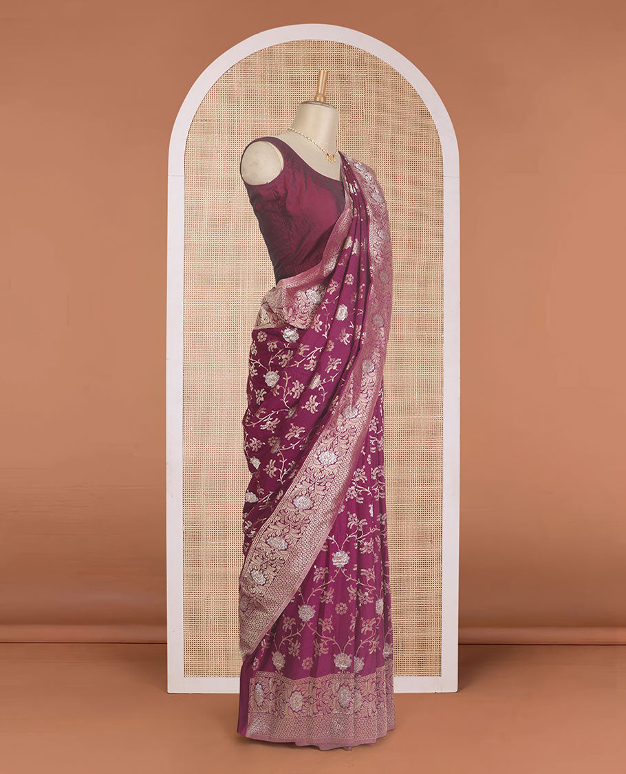 Maroon floral jaal jacquard fancy crepe saree, floral creeper zari border, and pallu of floral jaal design