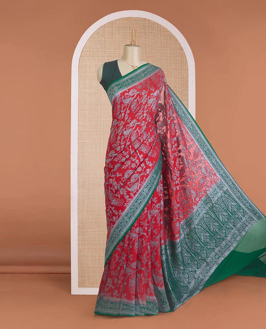 Red tree and peacock design banarasi georgette saree, contrast zari border, and pallu of Mughal style zari designs