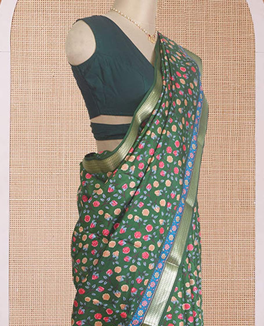 Green floral motifs printed silk saree, paisley zari motifs border, and pallu of stripes