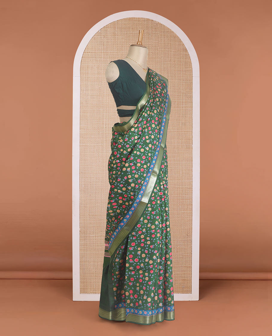 Green floral motifs printed silk saree, paisley zari motifs border, and pallu of stripes