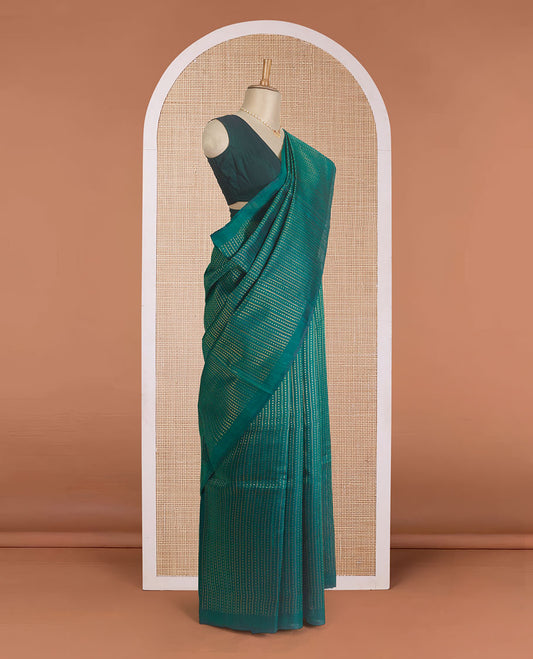 Borderless green dupion silk saree with stripes, and polka dots, zari rich pallu