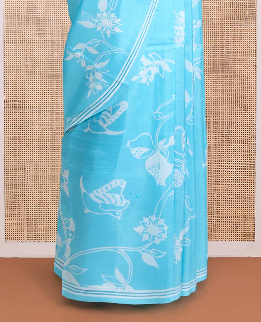 Blue floral vine design printed silk saree, self-border, and contrast pallu of unique print