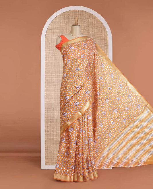Orange kalamkari floral vine, and peacock printed silk saree, paisley zari motifs border, and striped pallu