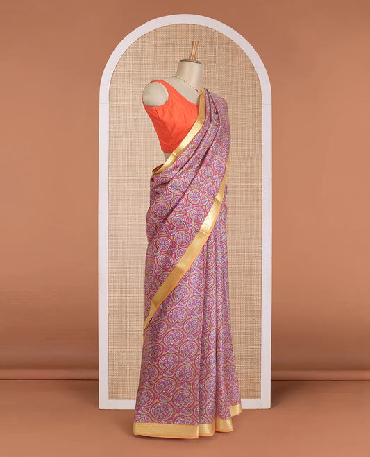 Pink intricate designs printed silk saree, contrast paisley zari motifs border, and printed pallu