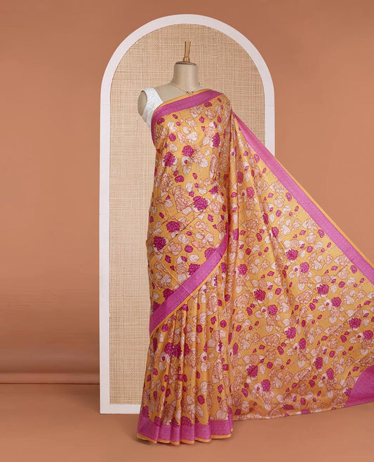 Yellow floral vine printed silk saree, contrast border, and pallu steeped with traditional designs