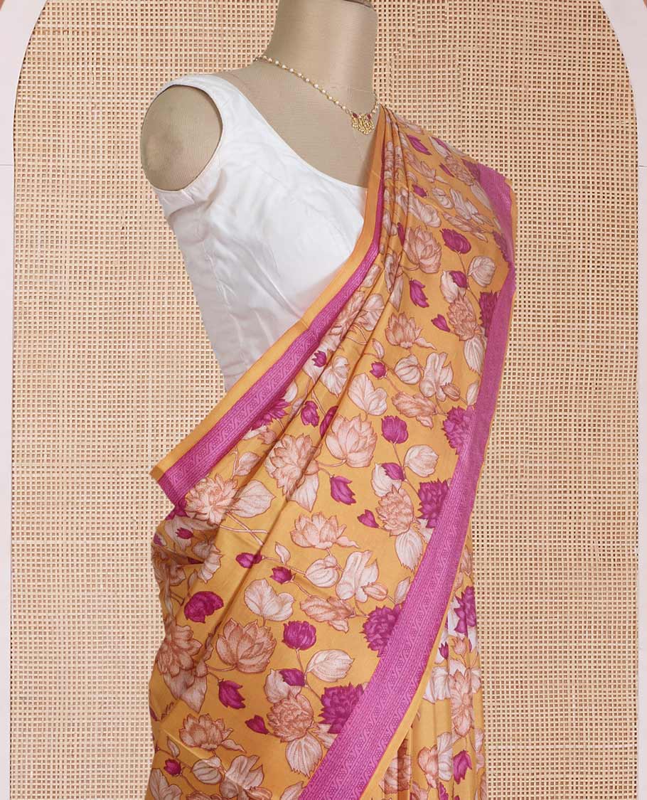 Yellow floral vine printed silk saree, contrast border, and pallu steeped with traditional designs