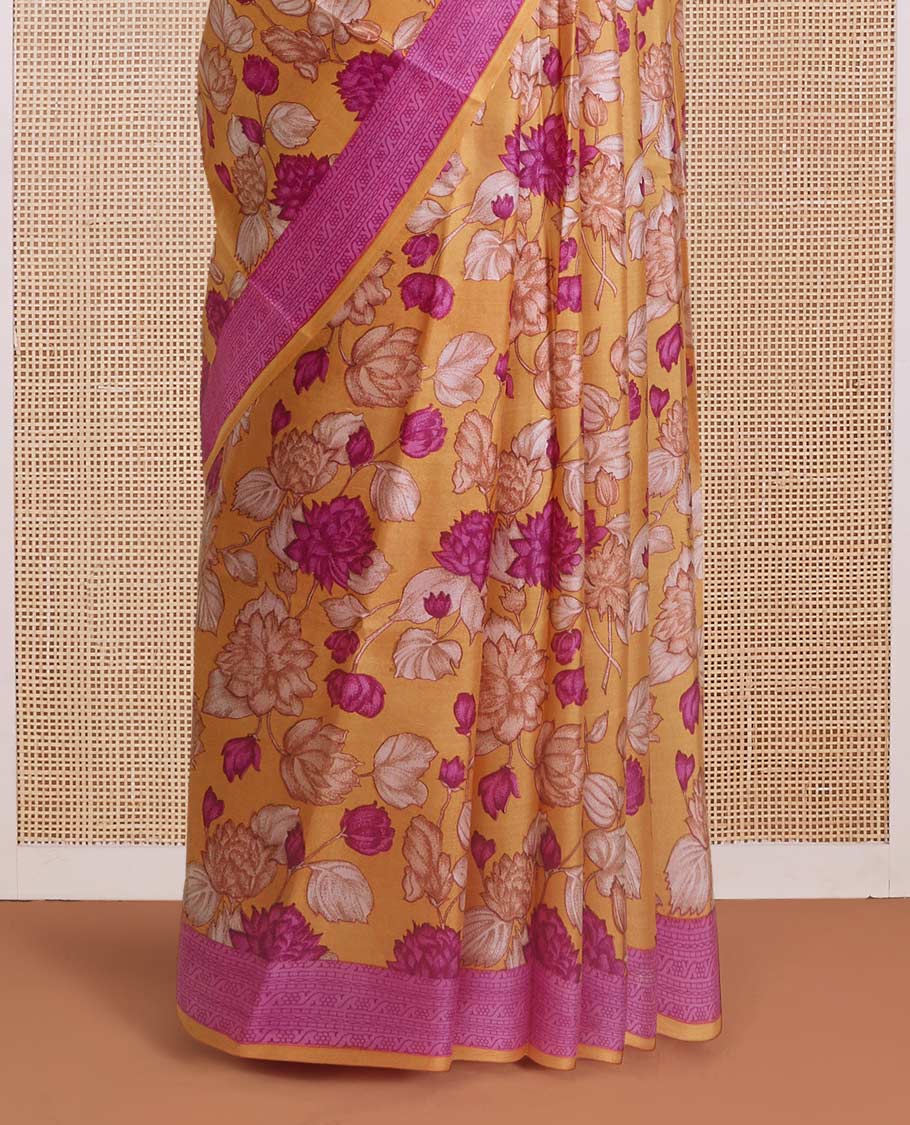 Yellow floral vine printed silk saree, contrast border, and pallu steeped with traditional designs