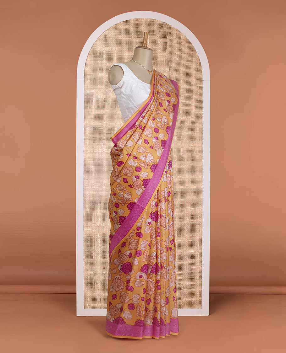 Yellow floral vine printed silk saree, contrast border, and pallu steeped with traditional designs