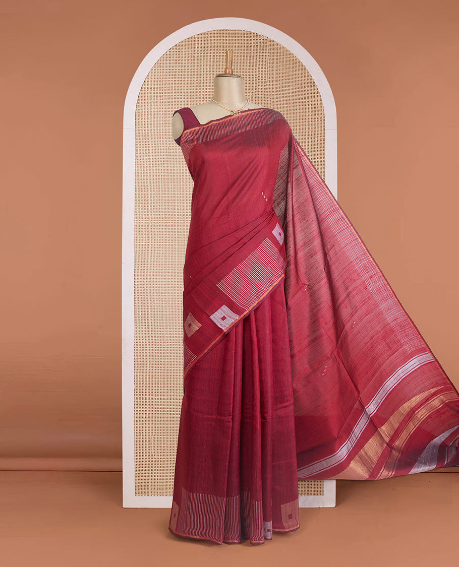 Maroon dupion silk saree with buttas, geometric patterned border, and zari rich pallu