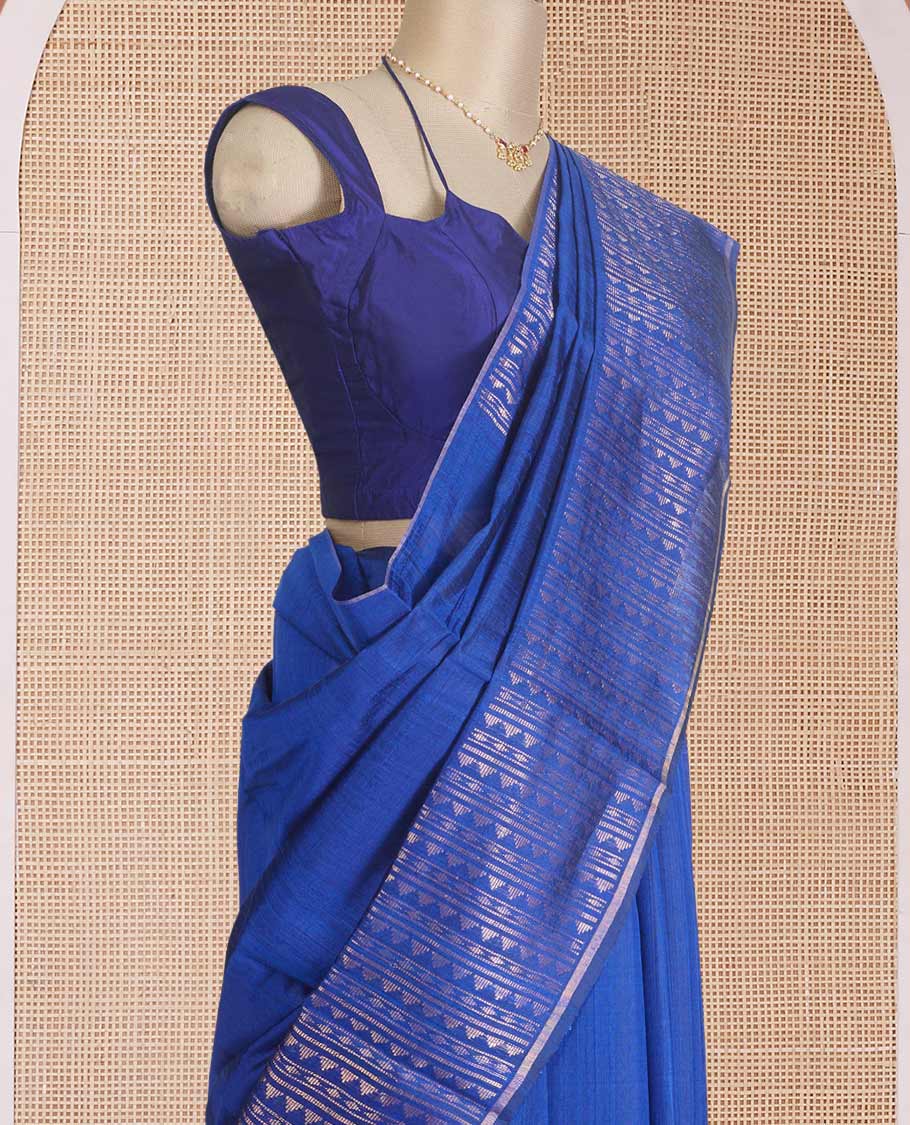 Blue plain dupion silk saree, zari border and pallu of temple, and geometric designs