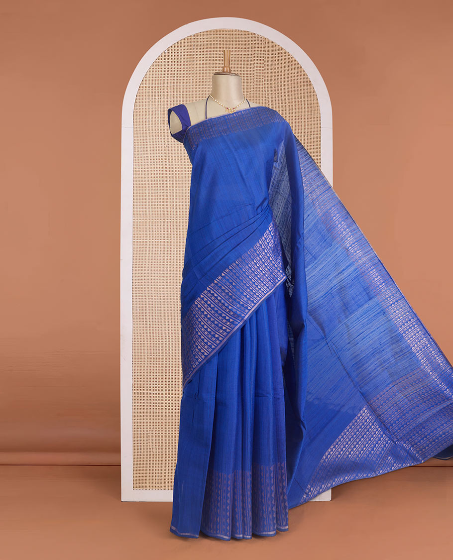 Blue plain dupion silk saree, zari border and pallu of temple, and geometric designs