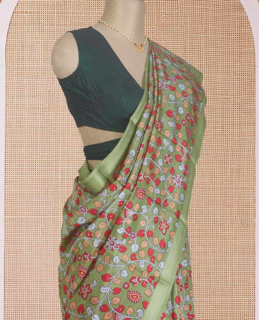 Green kalamkari floral vine printed silk saree, zari border, and pallu of stripes print