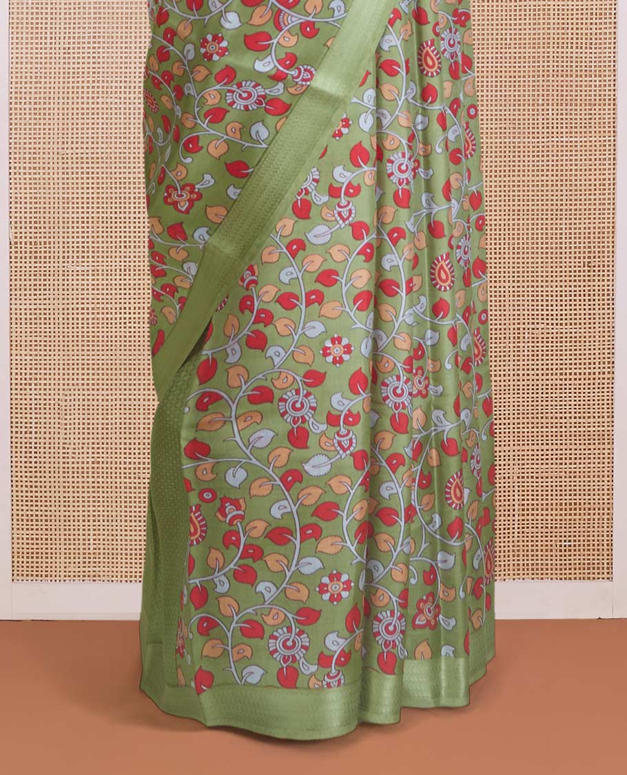 Green kalamkari floral vine printed silk saree, zari border, and pallu of stripes print