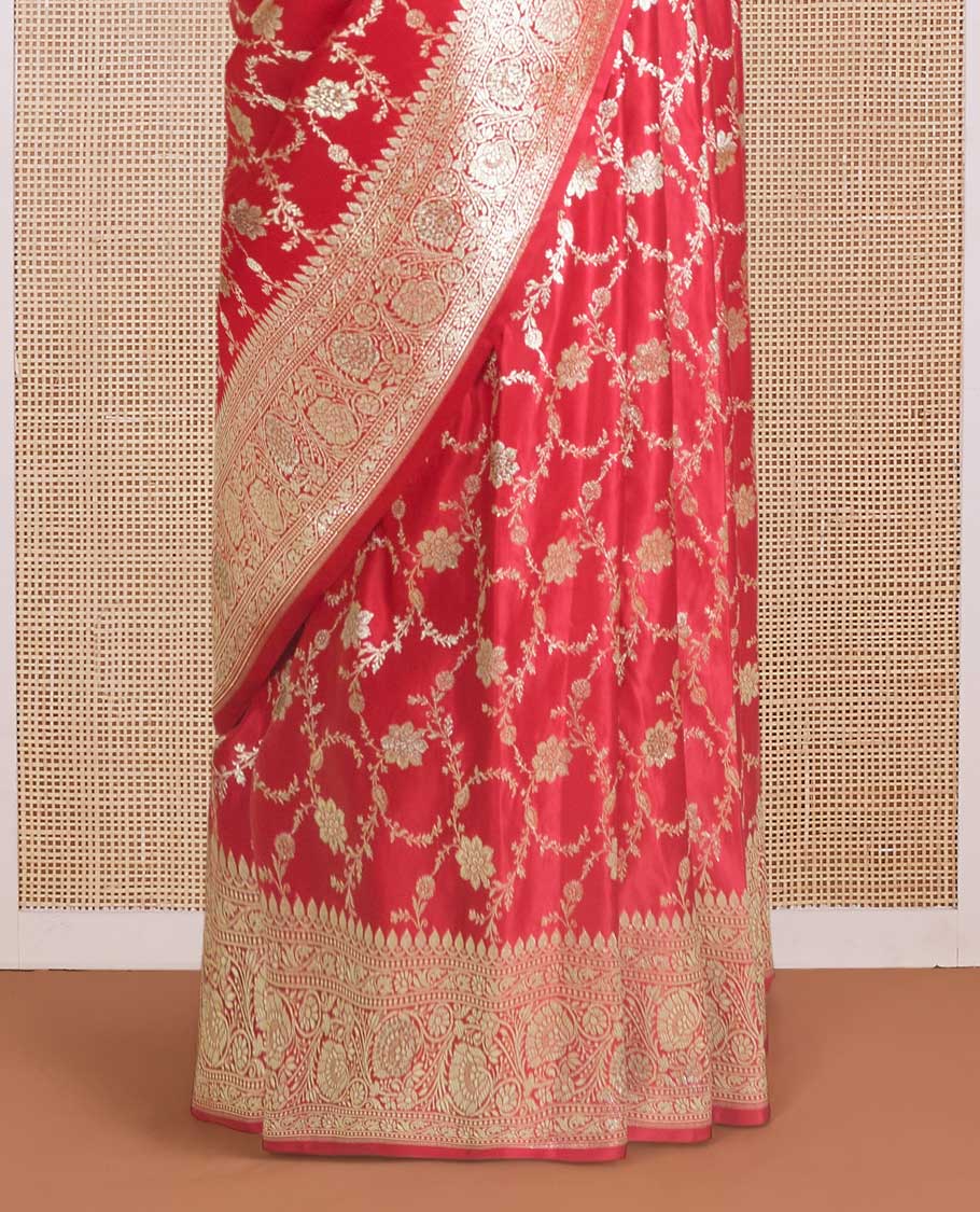 Red floral jaal jacquard with stone work Banaras Satin silk saree, floral creeper zari border, and pallu of thilkam design
