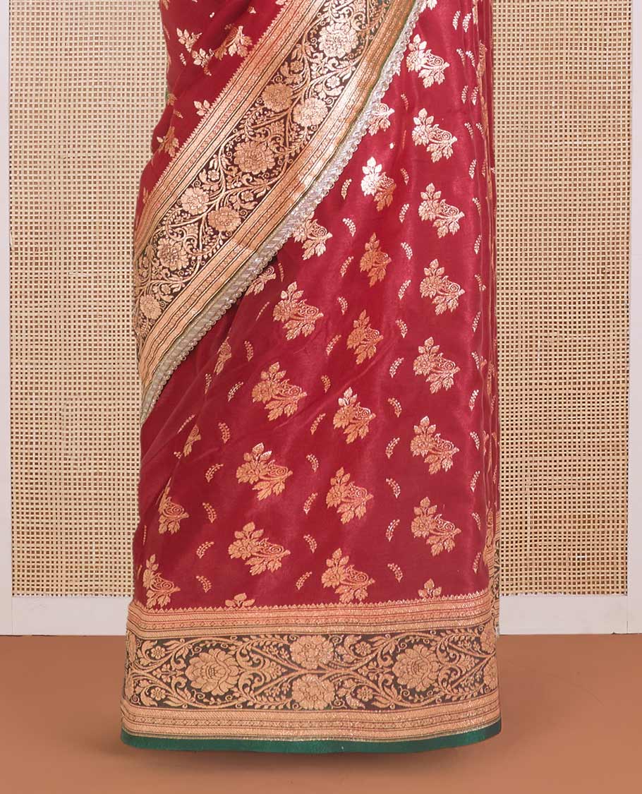 Red floral buttas with stone work Banaras Nylon silk saree, contrast floral creeper zari border, and Mughal-style intricately zari woven pallu