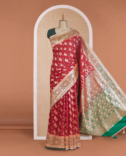 Red floral buttas with stone work Banaras Nylon silk saree, contrast floral creeper zari border, and Mughal-style intricately zari woven pallu