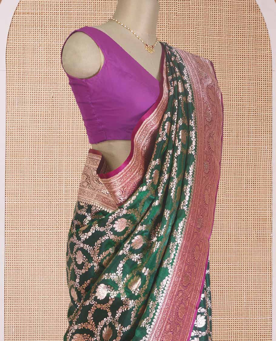 Green floral jaal jacquard with stone work Banaras Nylon silk saree, contrast floral creeper zari border, and intricately designed pallu