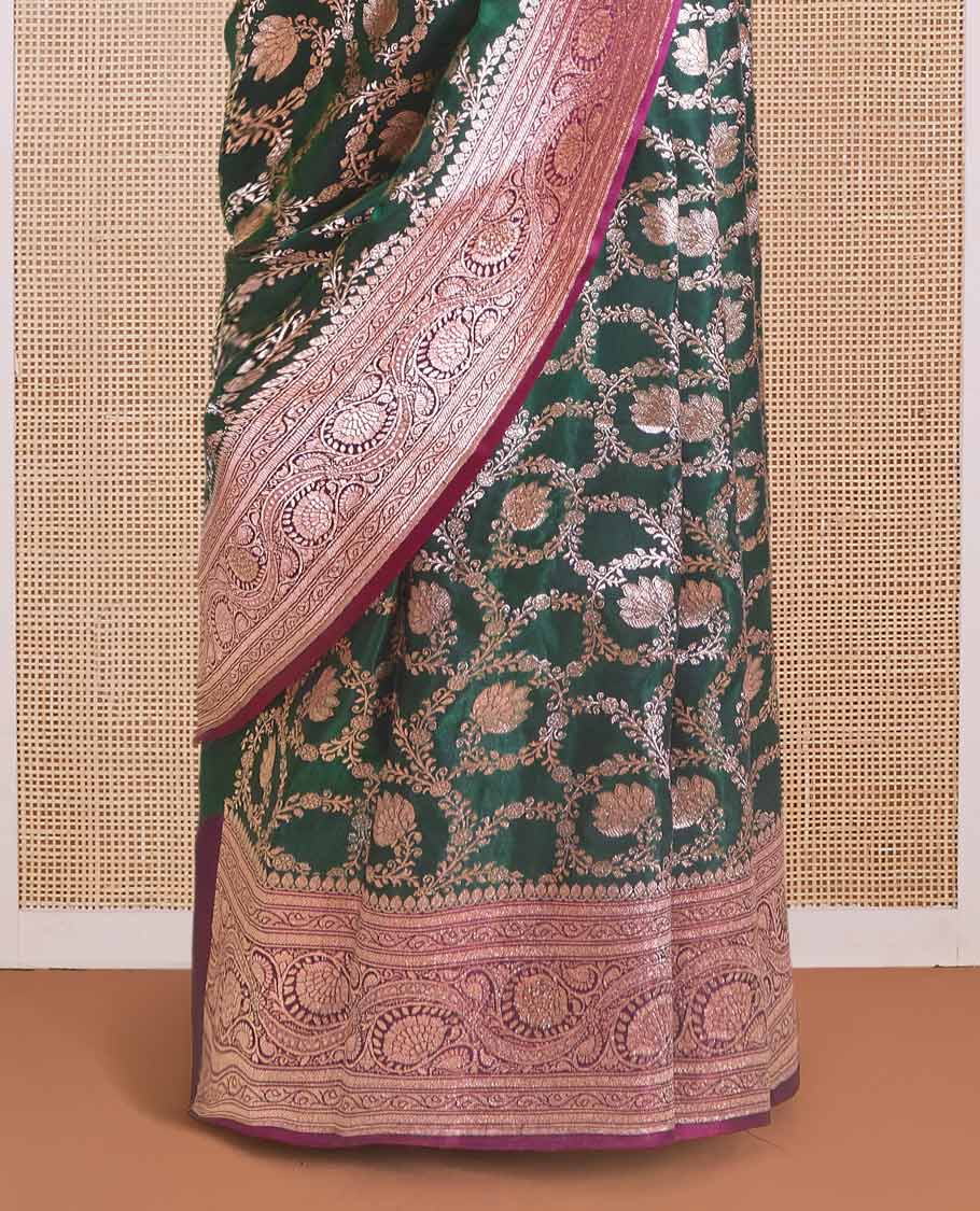 Green floral jaal jacquard with stone work Banaras Nylon silk saree, contrast floral creeper zari border, and intricately designed pallu