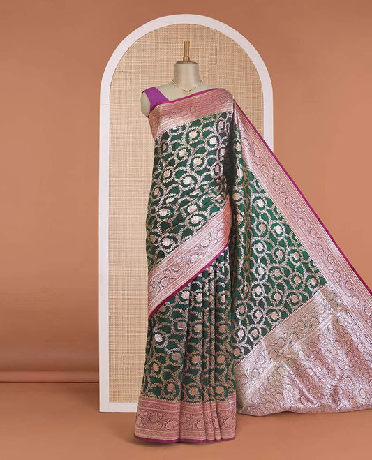 Green floral jaal jacquard with stone work Banaras Nylon silk saree, contrast floral creeper zari border, and intricately designed pallu