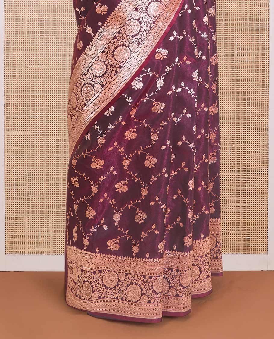 Wine purple floral jaal jacquard with stone work Banaras Nylon silk saree, traditional zari border of floral creeper designs, and intricate pallu