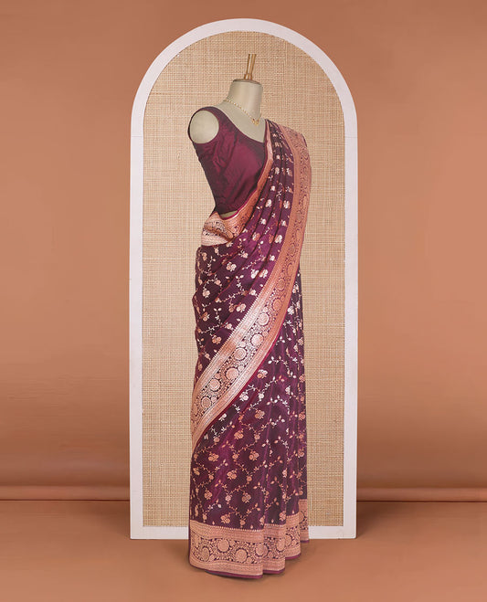 Wine purple floral jaal jacquard with stone work Banaras Nylon silk saree, traditional zari border of floral creeper designs, and intricate pallu