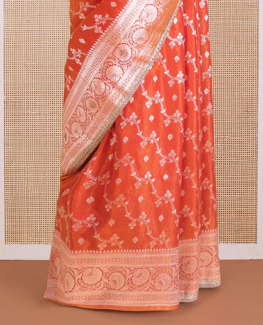 Orange diagonal floral stripes with stone work Banaras Satin silk saree, traditional zari design border, and jaal pallu