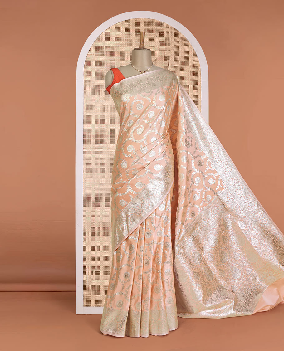 Peach floral jaal jacquard with stone work Banaras Satin silk saree, floral creeper zari border, and floral jaal pallu