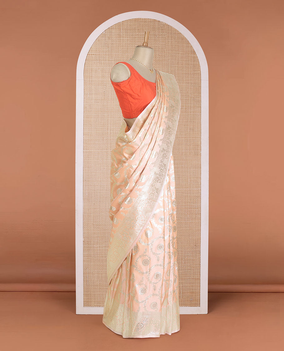 Peach floral jaal jacquard with stone work Banaras Satin silk saree, floral creeper zari border, and floral jaal pallu