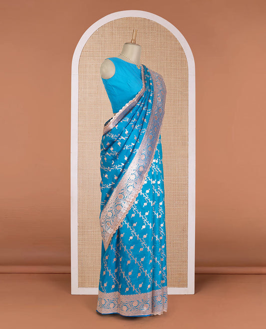 Azure blue diagonal floral stripes with stone work Banaras Nylon silk saree, traditional zari woven border of scallop lacework and stonework, and intricate pallu