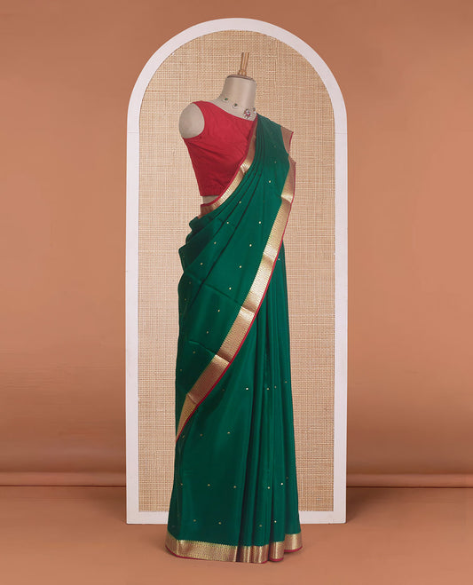 Green zari buttas Mysore silk saree, contrast traditional zari design border, and zari striped pallu