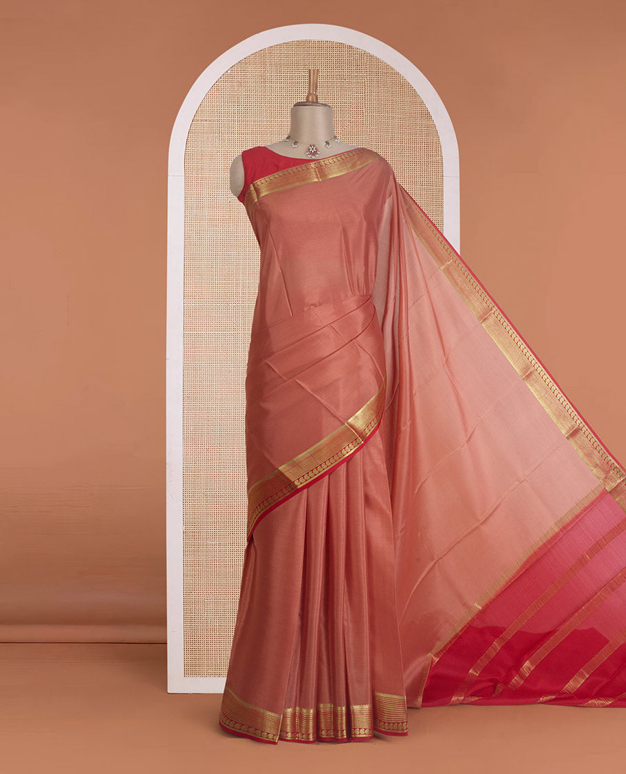 Peach plain Mysore silk saree, contrast traditional zari border of paisleys, and zari striped pallu