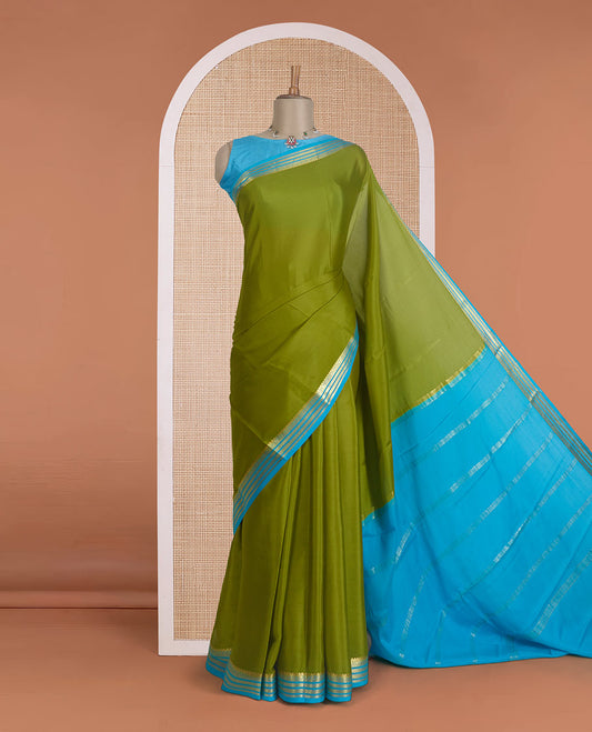 Parrot green plain Mysore silk saree, contrast traditional zari design border, and zari striped pallu