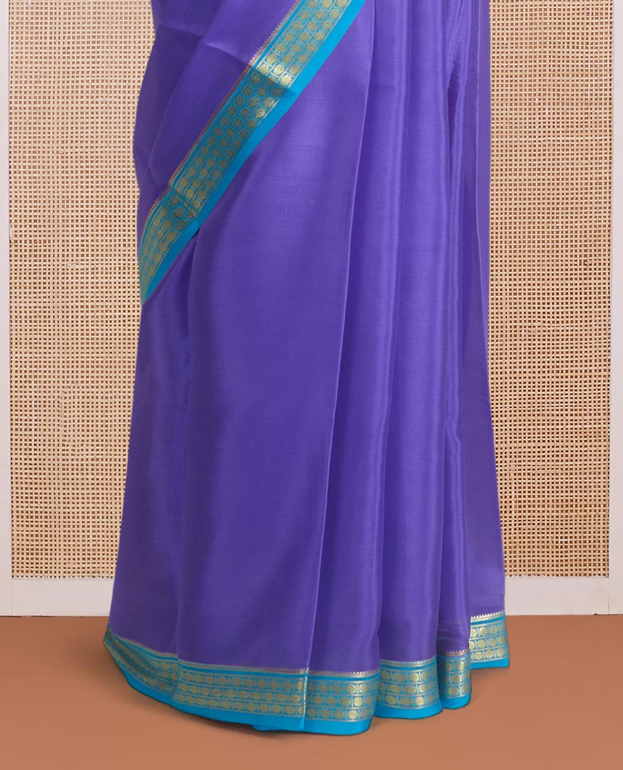 Violet plain Mysore silk saree, contrast floral zari design border, and zari striped pallu