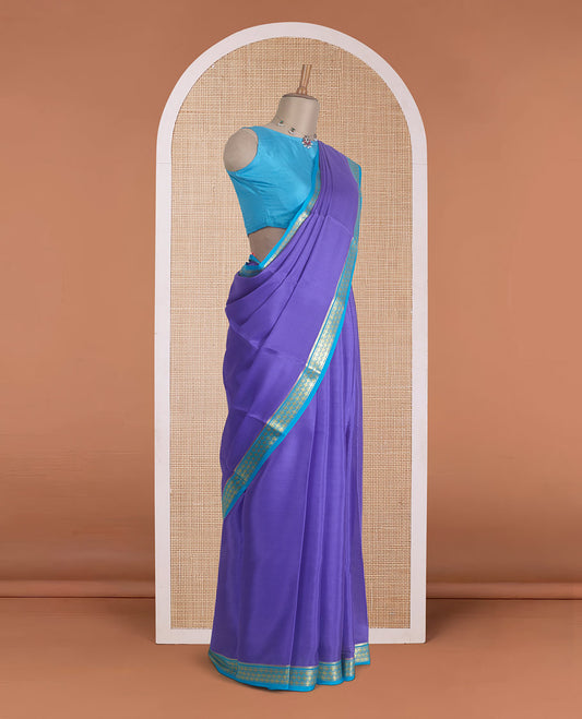 Violet plain Mysore silk saree, contrast floral zari design border, and zari striped pallu