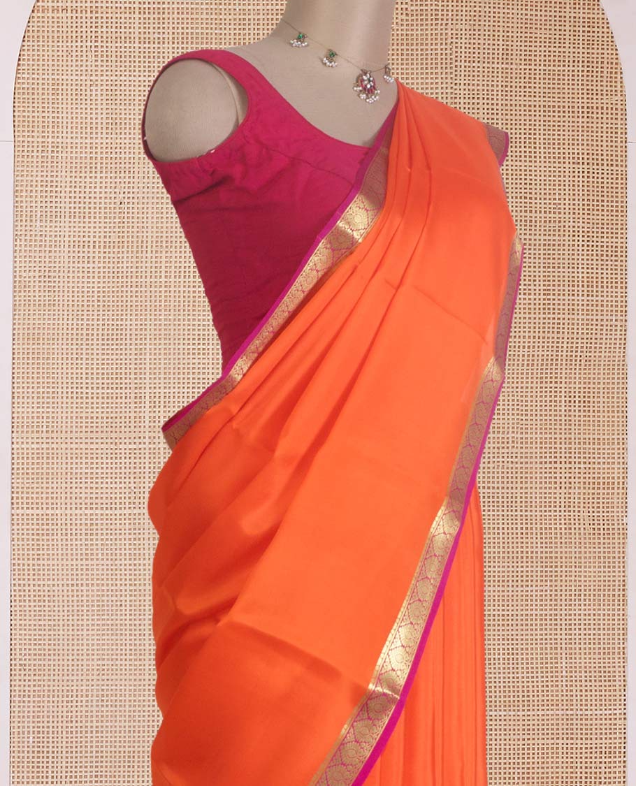 Jalebi orange plain Mysore silk saree, contrast Mughal style zari border, and zari striped pallu
